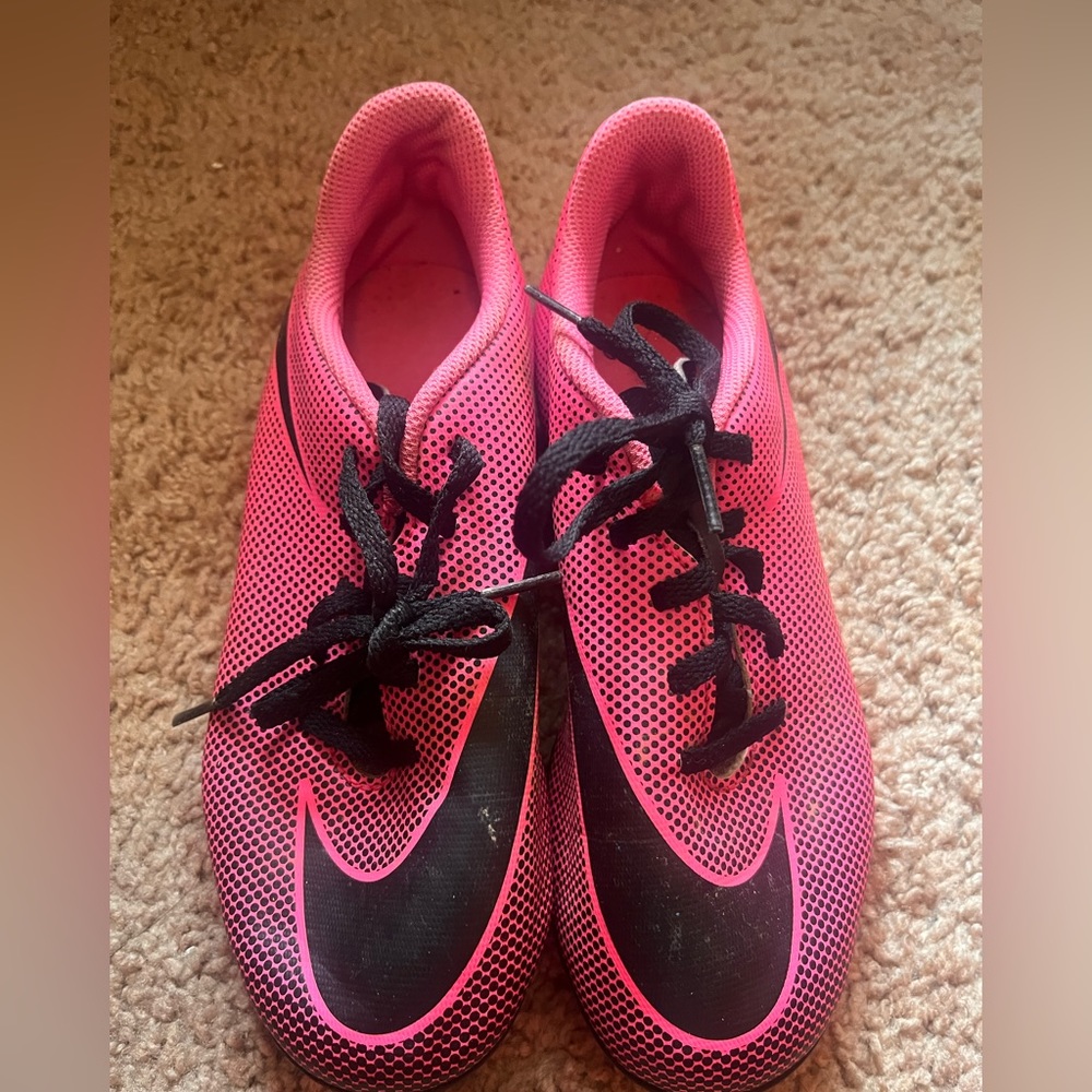 Pink and Black girls Nike Cleats. Work 1 season.
